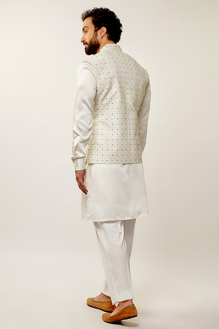 Ivory Silk Thread Embroidered Nehru Jacket Set by Dhruv Vaish at Pernia's Pop Up Shop
