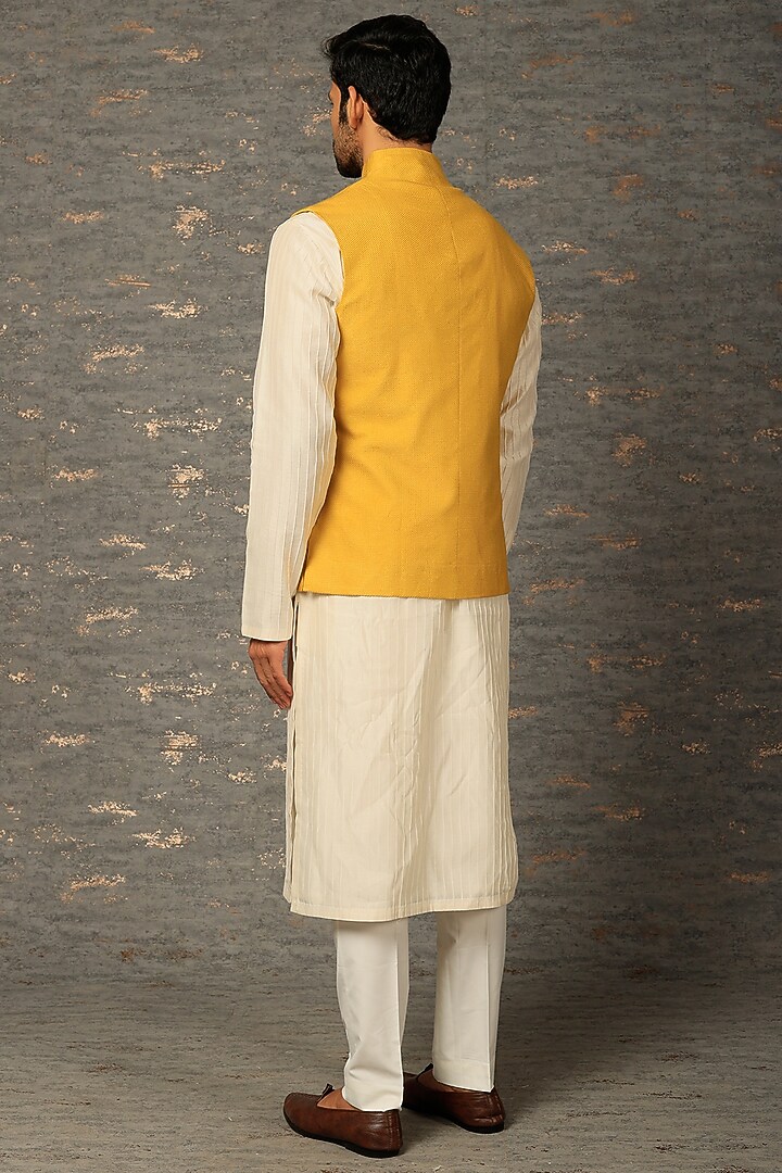 Yellow Textured Cotton Silk Nehru Jacket Set by Dhruv Vaish at Pernia's Pop Up Shop