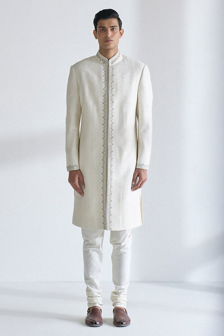 Ivory Silk Embroidered Groom Sherwani Set by Dhruv Vaish at Pernia's Pop Up Shop