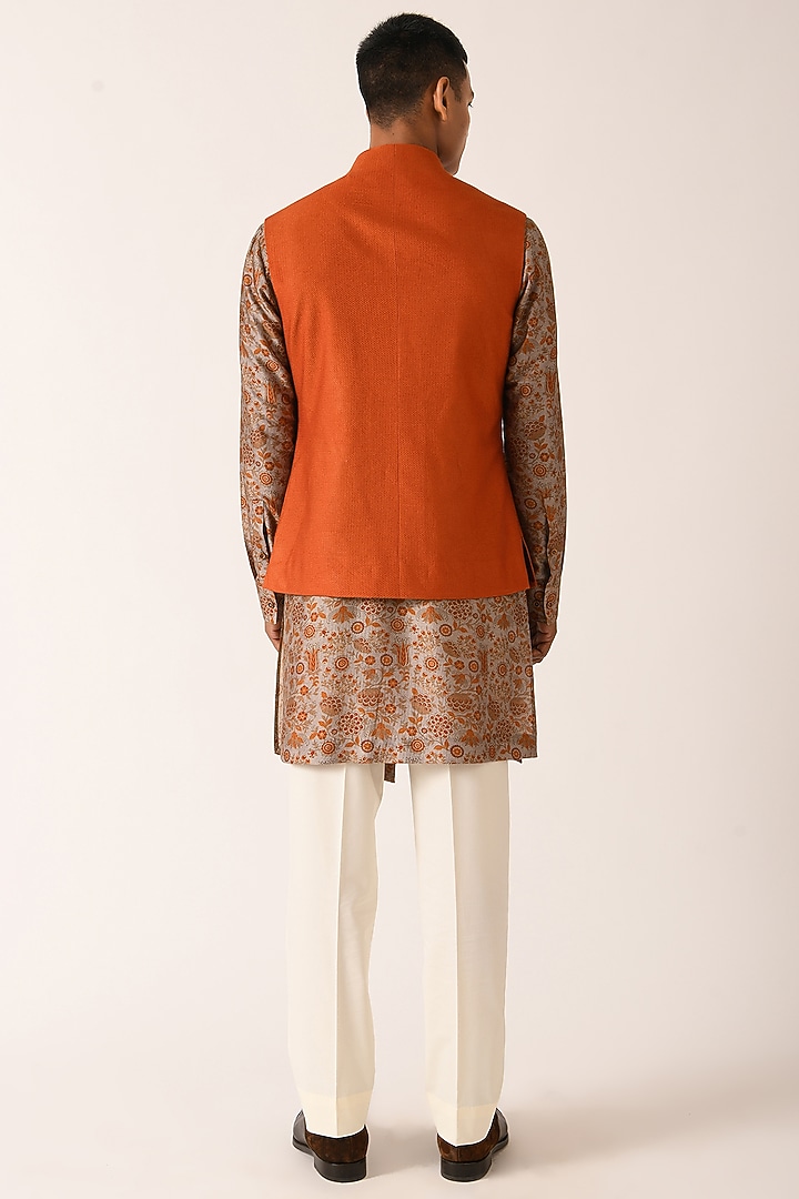 Rust Textured Cotton Silk Nehru Jacket by Dhruv Vaish at Pernia's Pop Up Shop