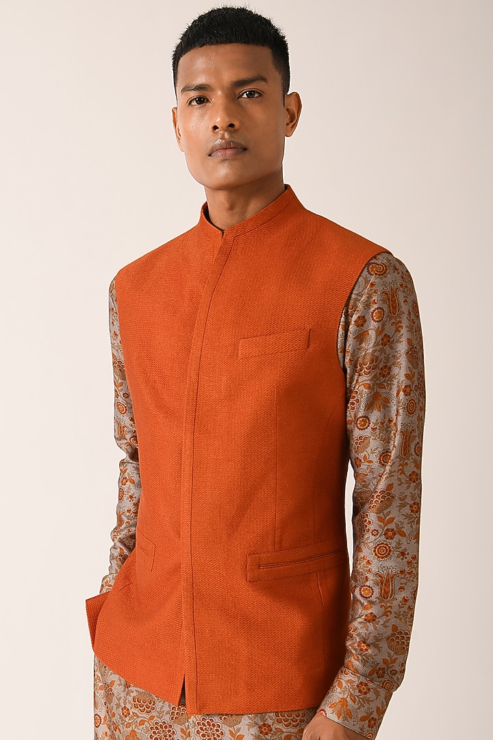 Rust Textured Cotton Silk Nehru Jacket by Dhruv Vaish at Pernia's Pop Up Shop