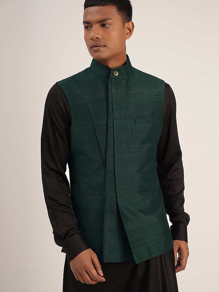 Bottle Green Raw Silk Paneled Nehru Jacket by Dhruv Vaish at Pernia's Pop Up Shop