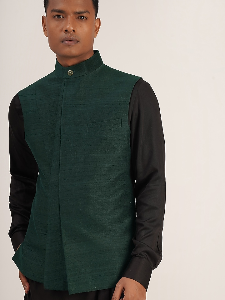 Bottle Green Raw Silk Paneled Nehru Jacket by Dhruv Vaish at Pernia's Pop Up Shop
