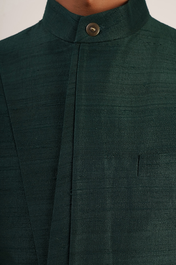Bottle Green Raw Silk Paneled Nehru Jacket by Dhruv Vaish at Pernia's Pop Up Shop