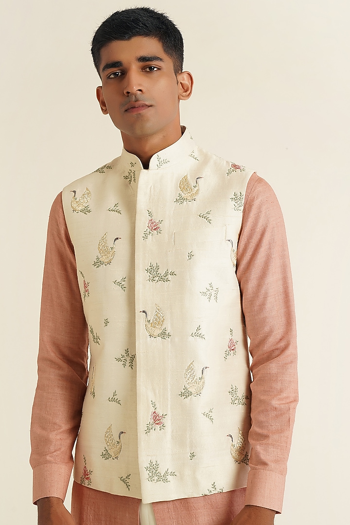 Ivory Silk Thread Embroidered Nehru Jacket by Dhruv Vaish at Pernia's Pop Up Shop