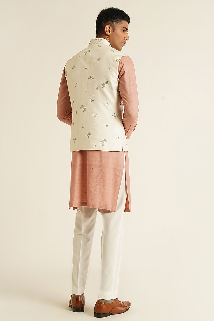 Ivory Silk Thread Embroidered Nehru Jacket by Dhruv Vaish at Pernia's Pop Up Shop