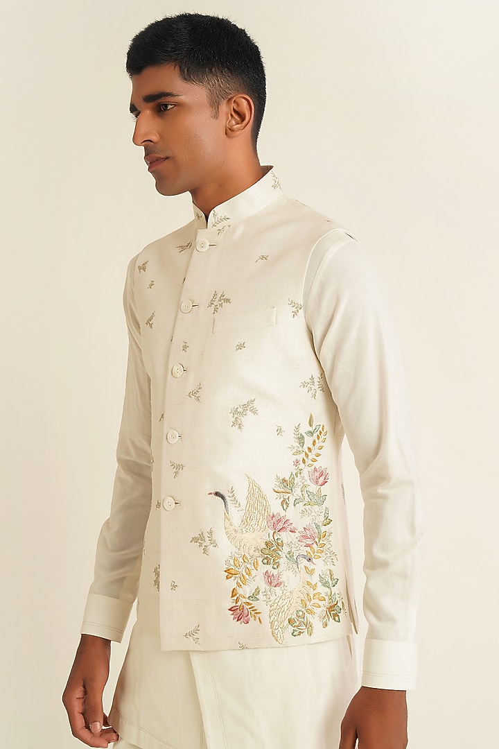 Ivory Silk Thread Embroidered Nehru Jacket by Dhruv Vaish at Pernia's Pop Up Shop