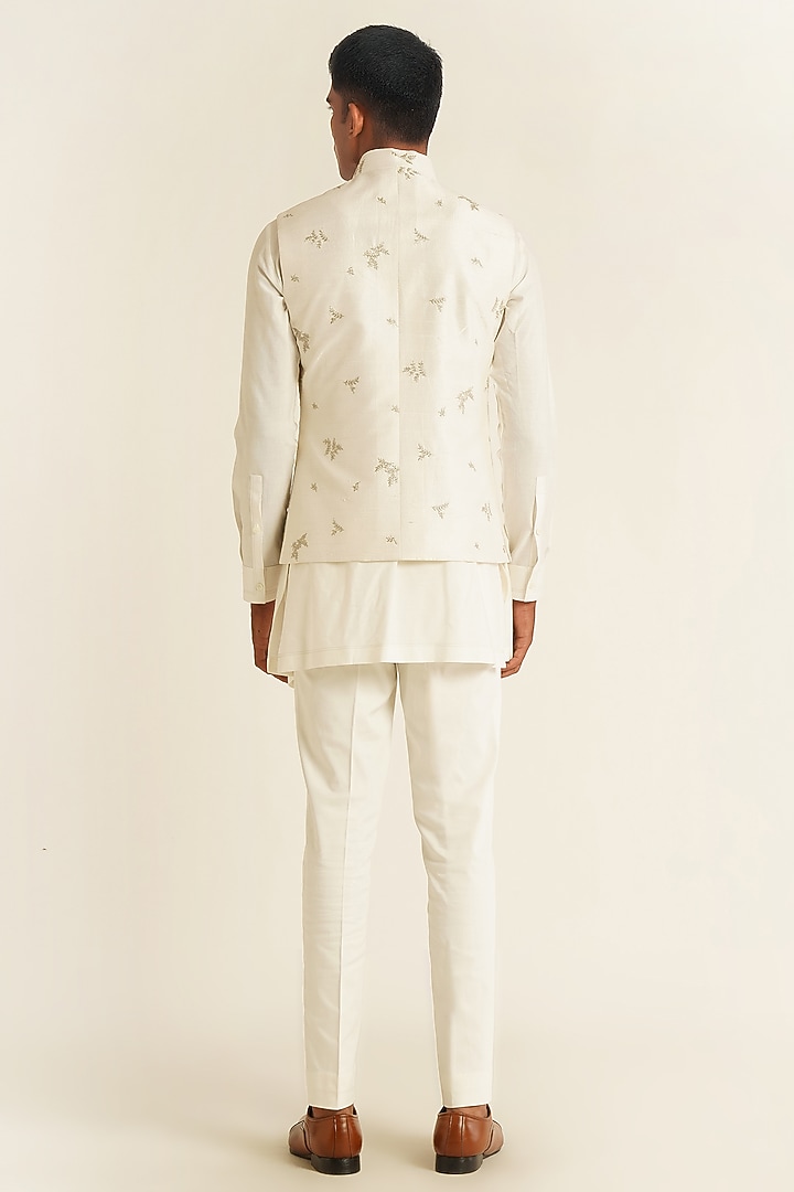 Ivory Silk Thread Embroidered Nehru Jacket by Dhruv Vaish at Pernia's Pop Up Shop