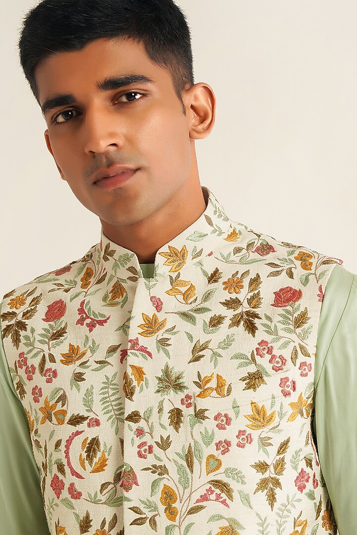 Ivory Silk Floral Embroidered Nehru Jacket by Dhruv Vaish at Pernia's Pop Up Shop