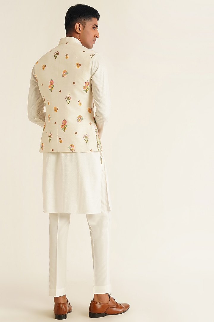 Ivory Silk Floral Embroidered Nehru Jacket by Dhruv Vaish at Pernia's Pop Up Shop