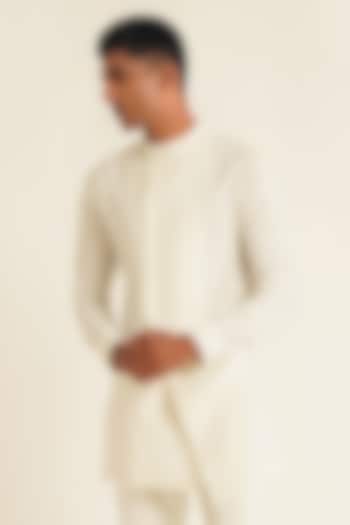 Ivory Cotton Silk Side-Open Kurta by Dhruv Vaish at Pernia's Pop Up Shop
