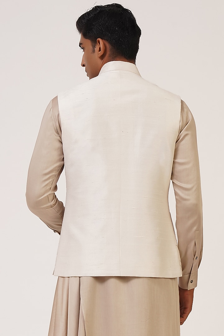 Ivory Silk Zari Embroidered Nehru Jacket by Dhruv Vaish at Pernia's Pop Up Shop