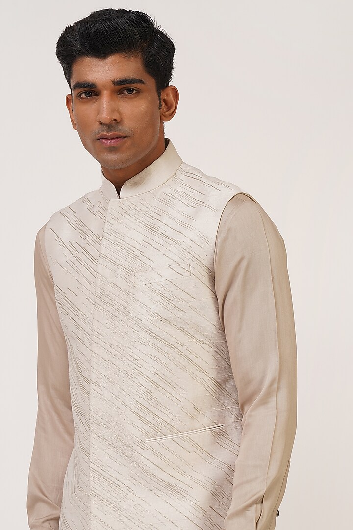 Ivory Silk Zari Embroidered Nehru Jacket by Dhruv Vaish at Pernia's Pop Up Shop
