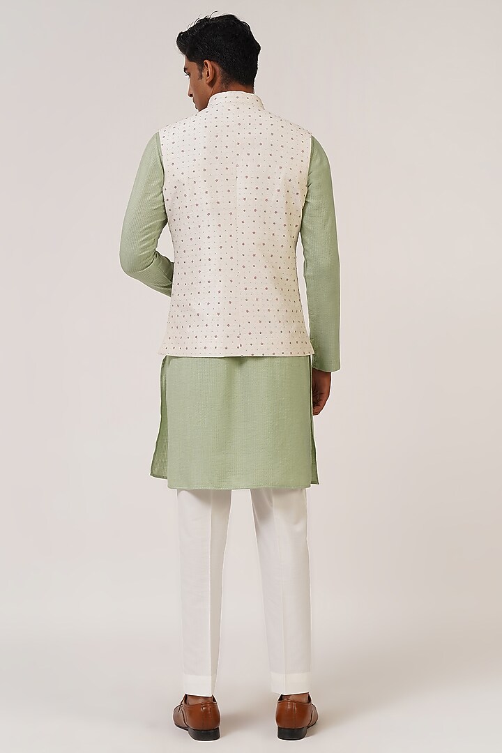 Ivory Silk Thread Embroidered Nehru Jacket by Dhruv Vaish at Pernia's Pop Up Shop