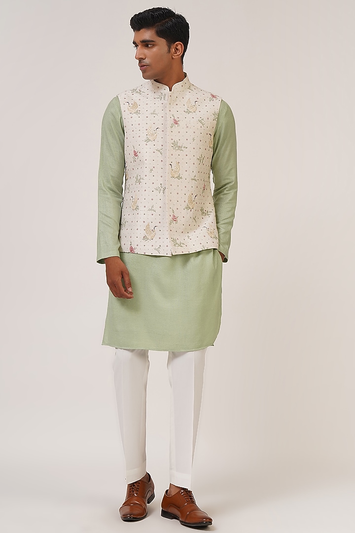 Ivory Silk Thread Embroidered Nehru Jacket by Dhruv Vaish at Pernia's Pop Up Shop