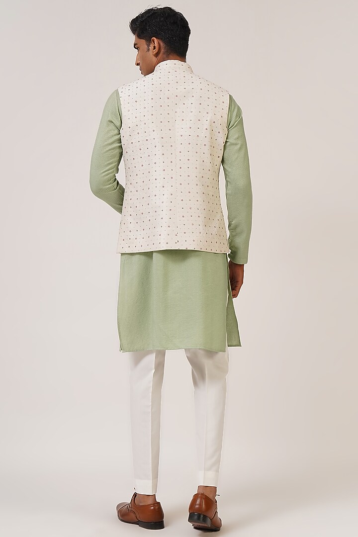 Ivory Silk Thread Embroidered Nehru Jacket by Dhruv Vaish at Pernia's Pop Up Shop