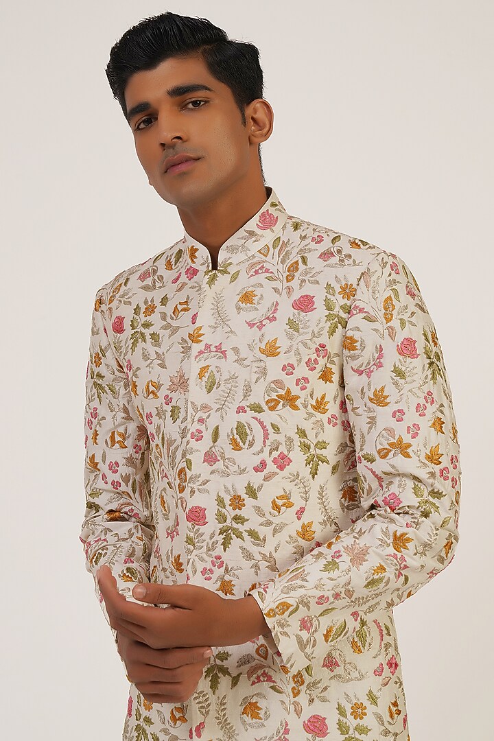 Ivory Silk Thread Embroidered Groom Sherwani Set by Dhruv Vaish at Pernia's Pop Up Shop