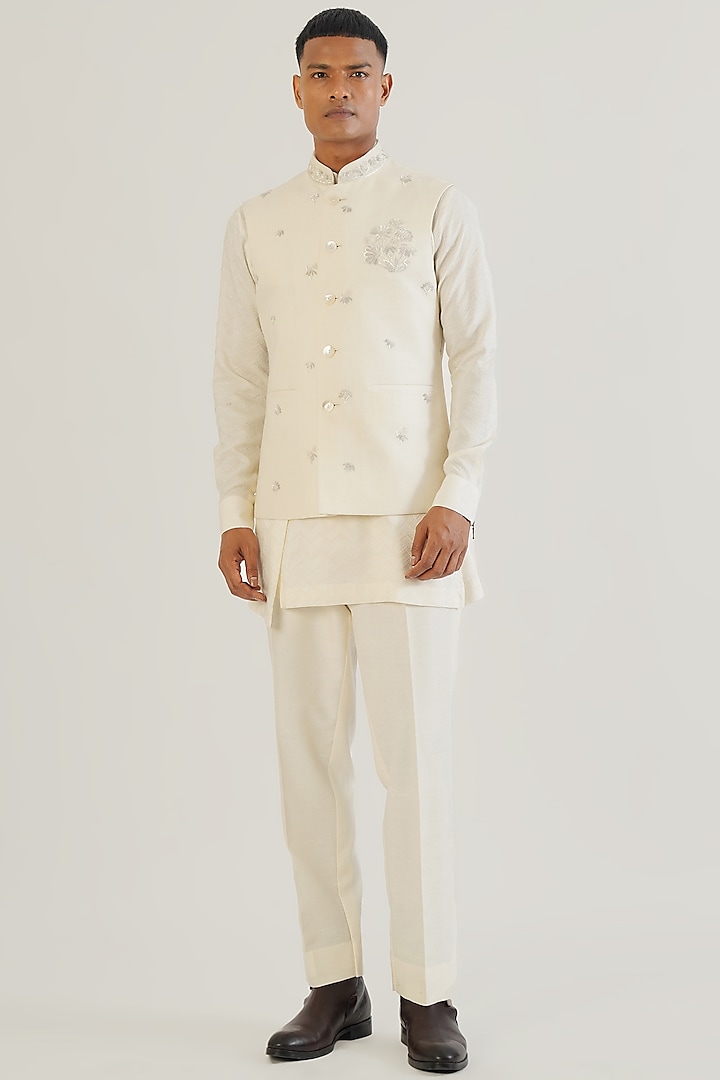 Ivory Silk Floral Motifs Embroidered Nehru Jacket by Dhruv Vaish