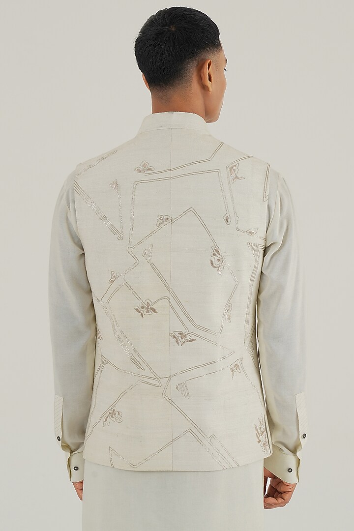 Ivory Silk Geometric Embroidered Nehru Jacket by Dhruv Vaish at Pernia's Pop Up Shop