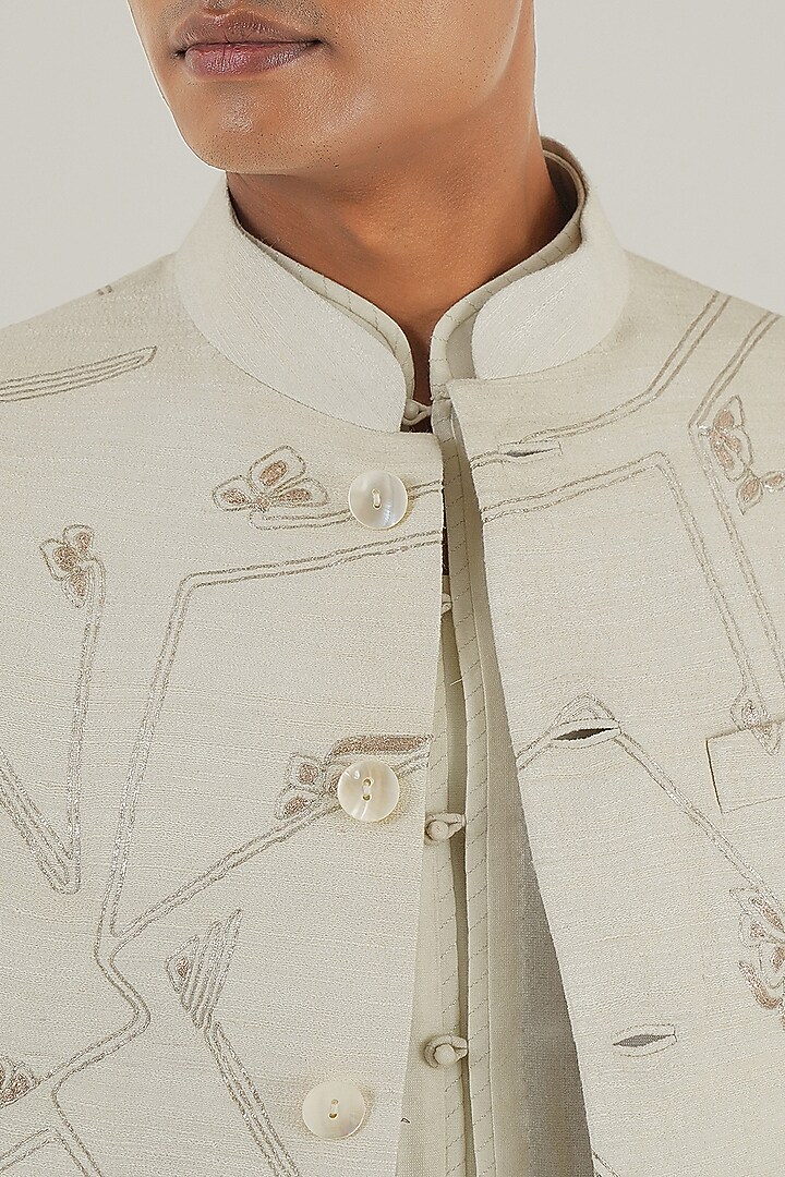 Ivory Silk Geometric Embroidered Nehru Jacket by Dhruv Vaish at Pernia's Pop Up Shop