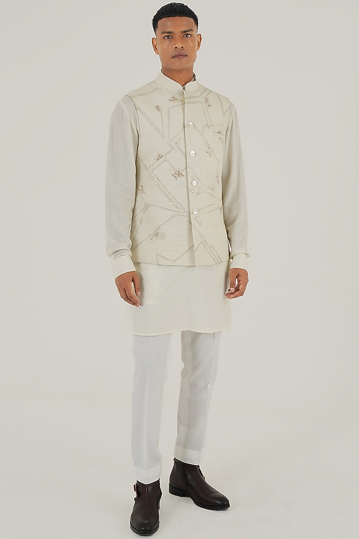 Ivory Silk Geometric Embroidered Nehru Jacket by Dhruv Vaish at Pernia's Pop Up Shop
