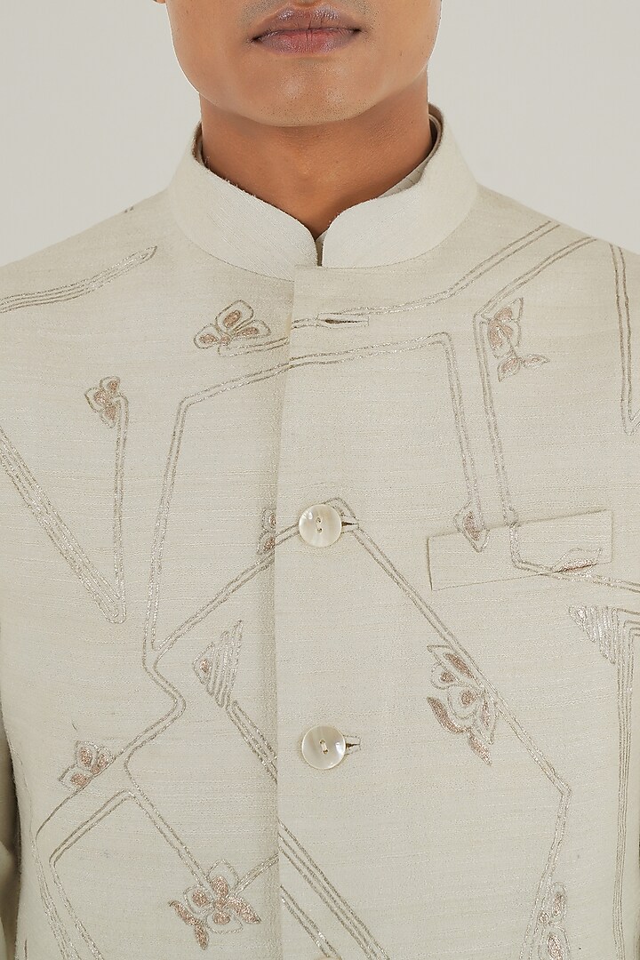 Ivory Silk Geometric Embroidered Nehru Jacket by Dhruv Vaish at Pernia's Pop Up Shop