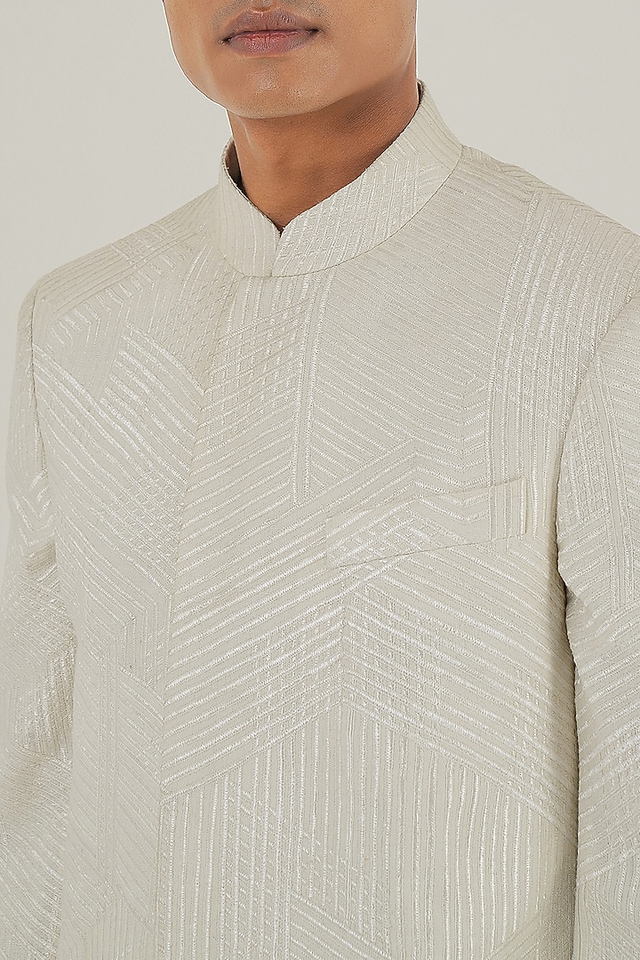 Ivory Silk Tonal Lace Embroidered Wedding Bandhgala by Dhruv Vaish at Pernia's Pop Up Shop