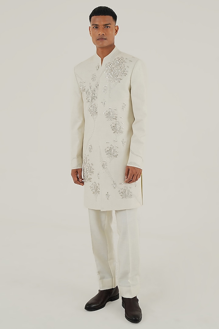 Ivory Silk Zari Motifs Embroidered Groom Sherwani by Dhruv Vaish at Pernia's Pop Up Shop