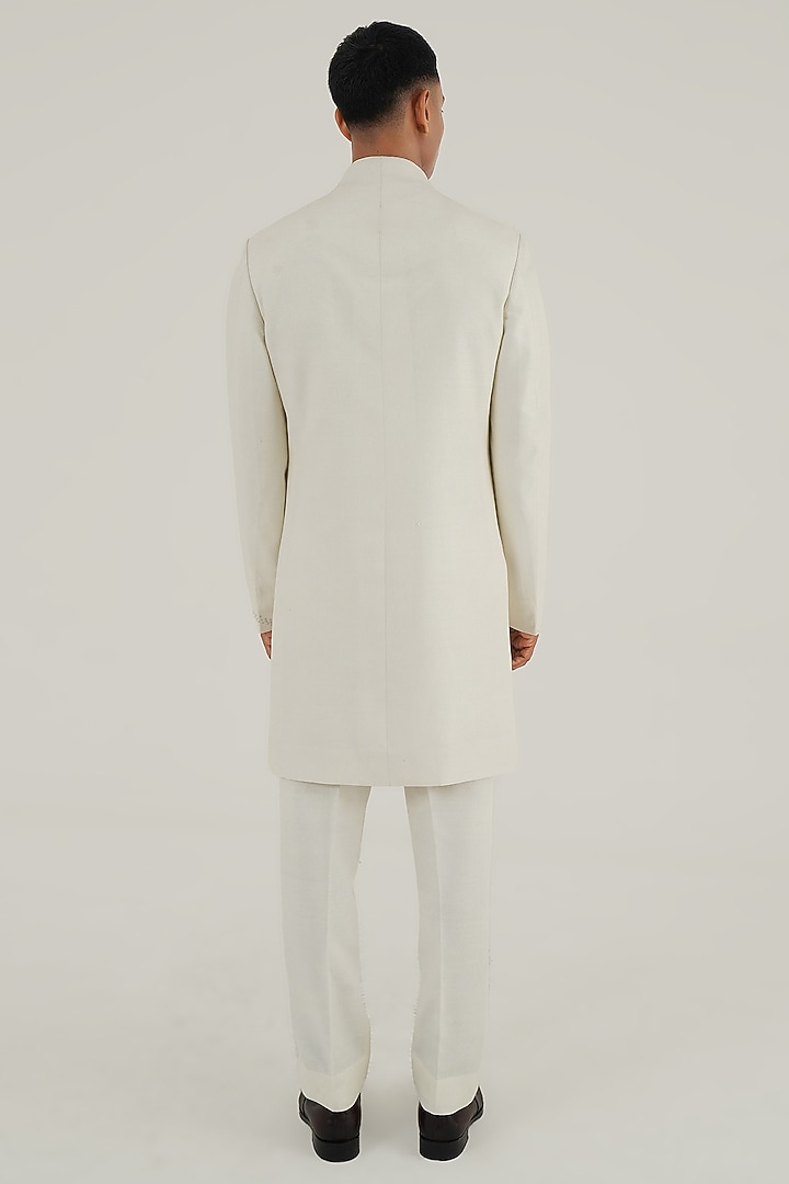 Ivory Silk Zari Motifs Embroidered Groom Sherwani by Dhruv Vaish at Pernia's Pop Up Shop
