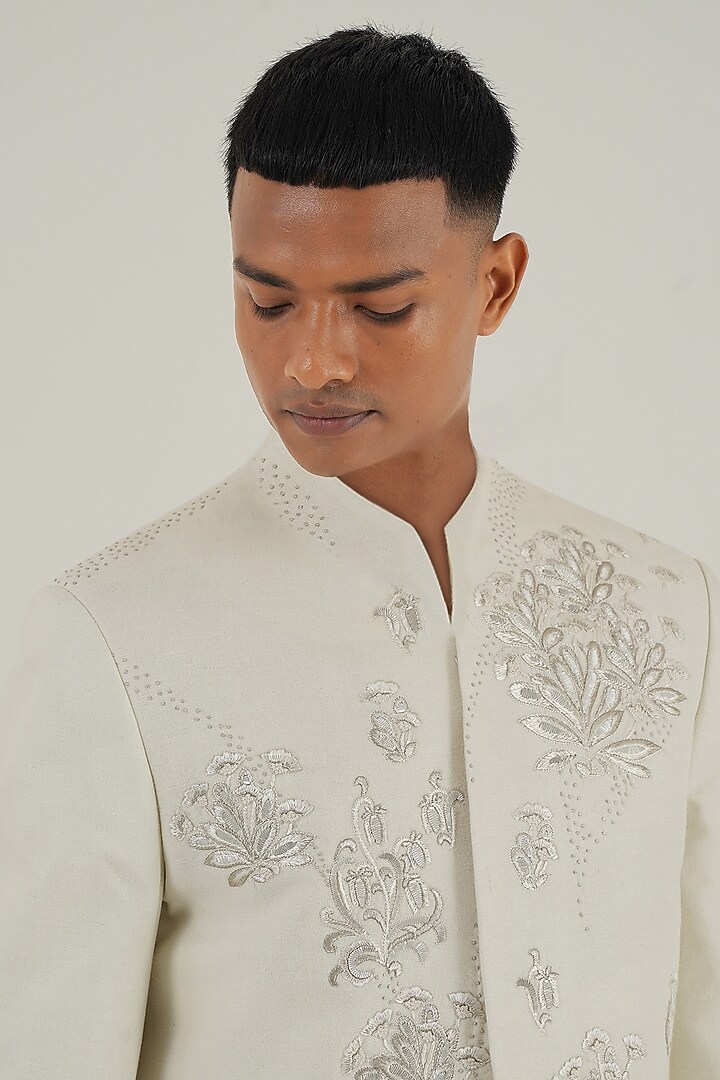 Ivory Silk Zari Motifs Embroidered Groom Sherwani by Dhruv Vaish at Pernia's Pop Up Shop