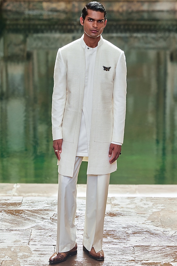 Ivory Silk Pintucks Wedding Sherwani by Dhruv Vaish at Pernia's Pop Up Shop