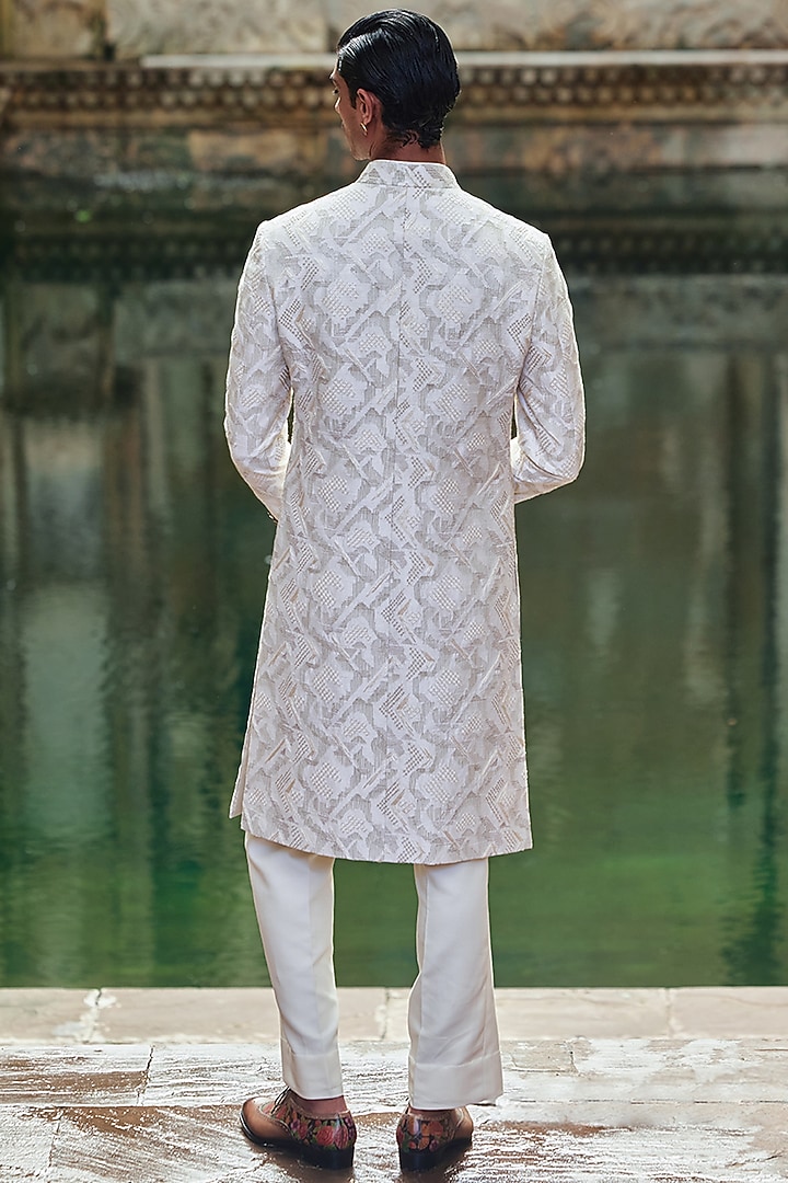 Ivory Silk Thread Hand Embroidered Groom Sherwani Set by Dhruv Vaish at Pernia's Pop Up Shop