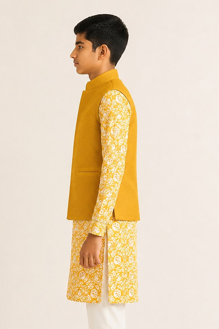 Marigold Yellow Silk Pintuck Nehru Jacket For Boys by Dhruv Vaish Kids at Pernia's Pop Up Shop