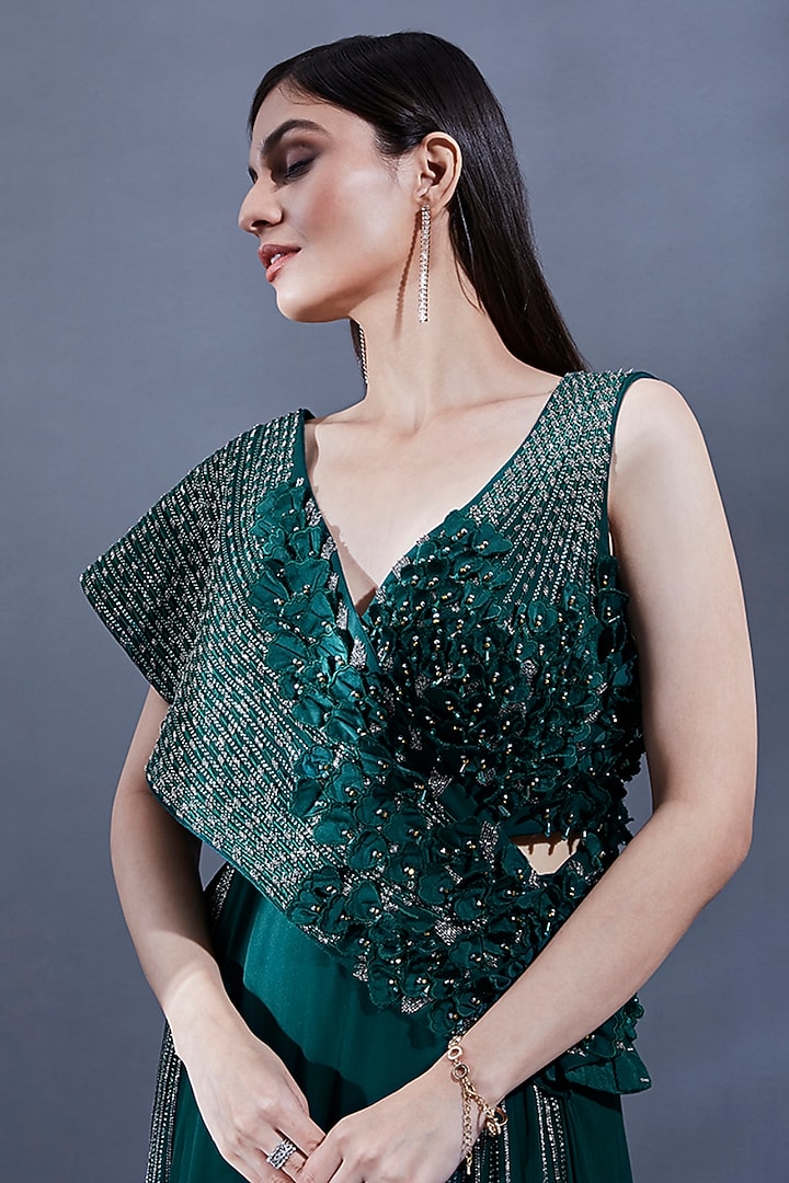 Bottle Green Satin Georgette 3D Hand Embroidered Cut-Out Engagement Gown With Cape by Dhwaja at Pernia's Pop Up Shop