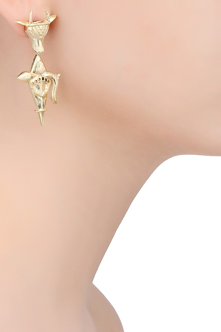 Dhora presents Gold finish holy cow weapon earrings available only at Pernia's Pop Up Shop.