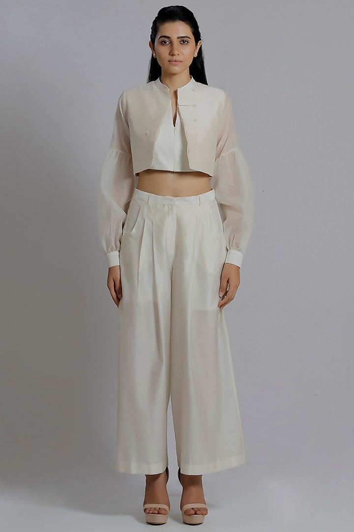 White Chanderi Silk Flared Pants by DHI