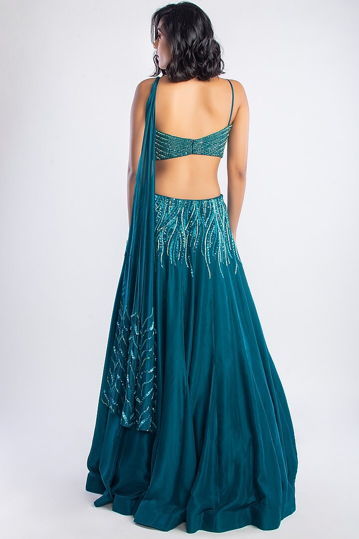 Teal Embroidered Wedding Lehenga Set by Dhwaja at Pernia's Pop Up Shop