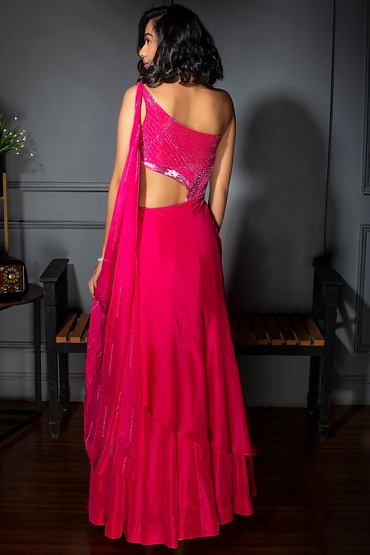Fuchsia Embroidered Layered One-Shoulder Gown by Dhwaja at Pernia's Pop Up Shop