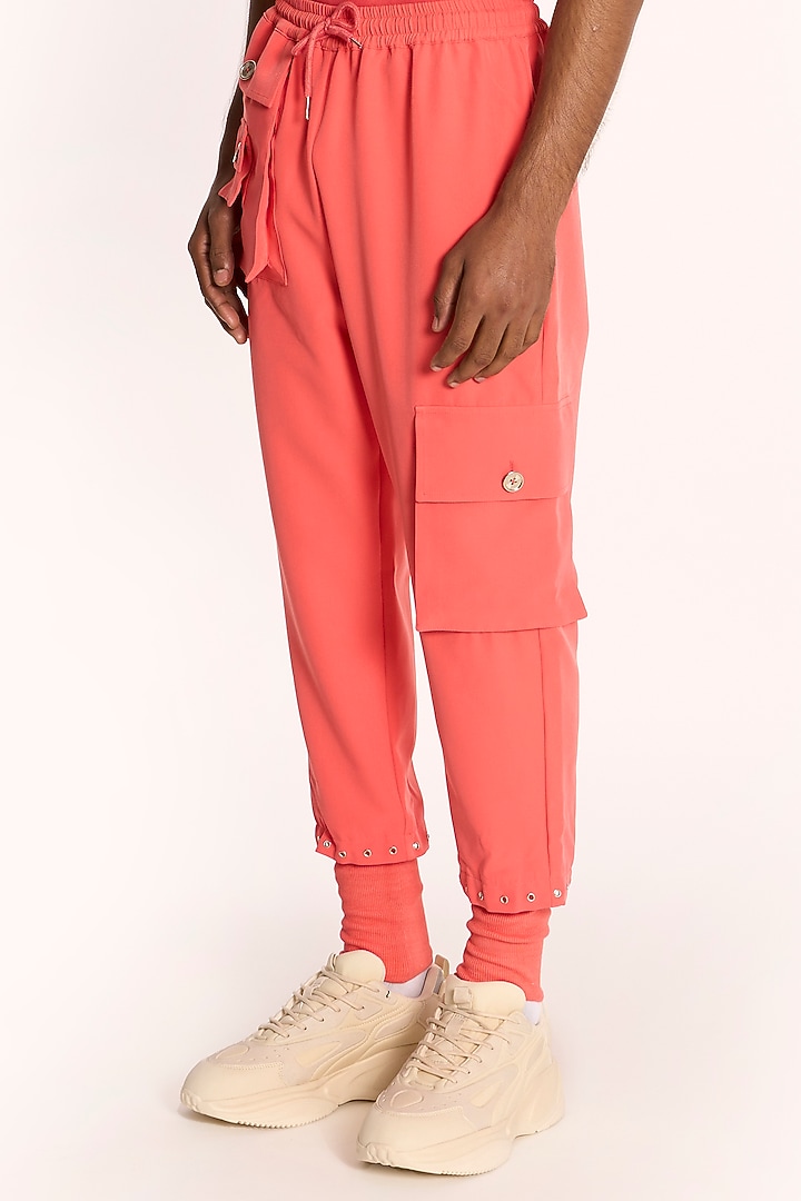 Coral Pink Banana Crepe Jogger Pants by DIERMEISS BY THE DRAGON LADY at Pernia's Pop Up Shop