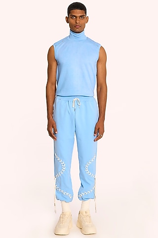 Pastel Blue Banana Crepe Jogger Pants by DIERMEISS BY THE DRAGON LADY