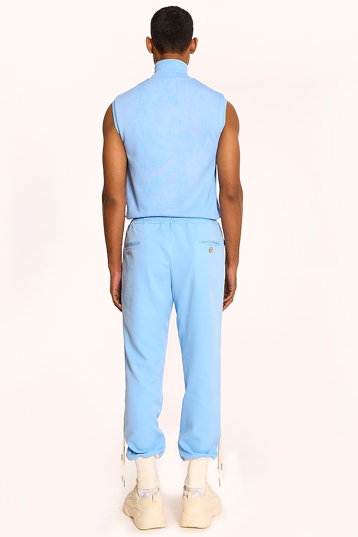Pastel Blue Banana Crepe Jogger Pants by DIERMEISS BY THE DRAGON LADY at Pernia's Pop Up Shop