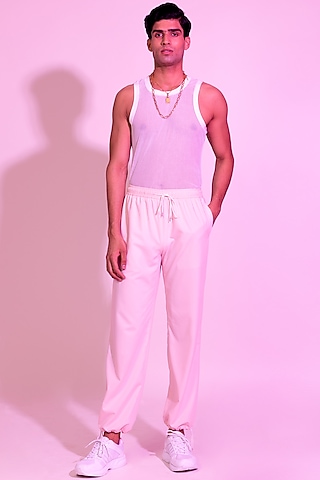 Peach Terry Rayon Jogger Pants by DIERMEISS BY THE DRAGON LADY