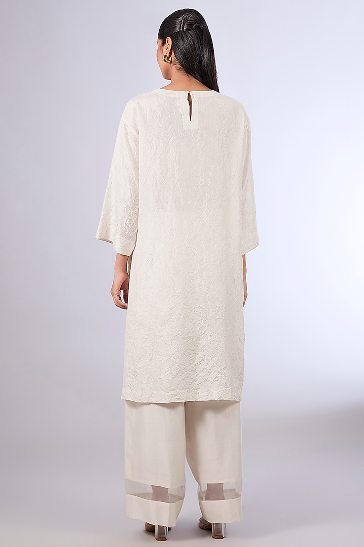 Ivory Mulberry Silk Kurta Set by Divyam Mehta at Pernia's Pop Up Shop