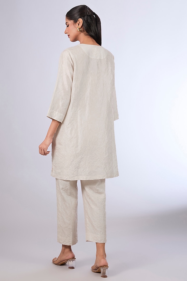 Ivory Mulberry Silk Kurta Set by Divyam Mehta at Pernia's Pop Up Shop