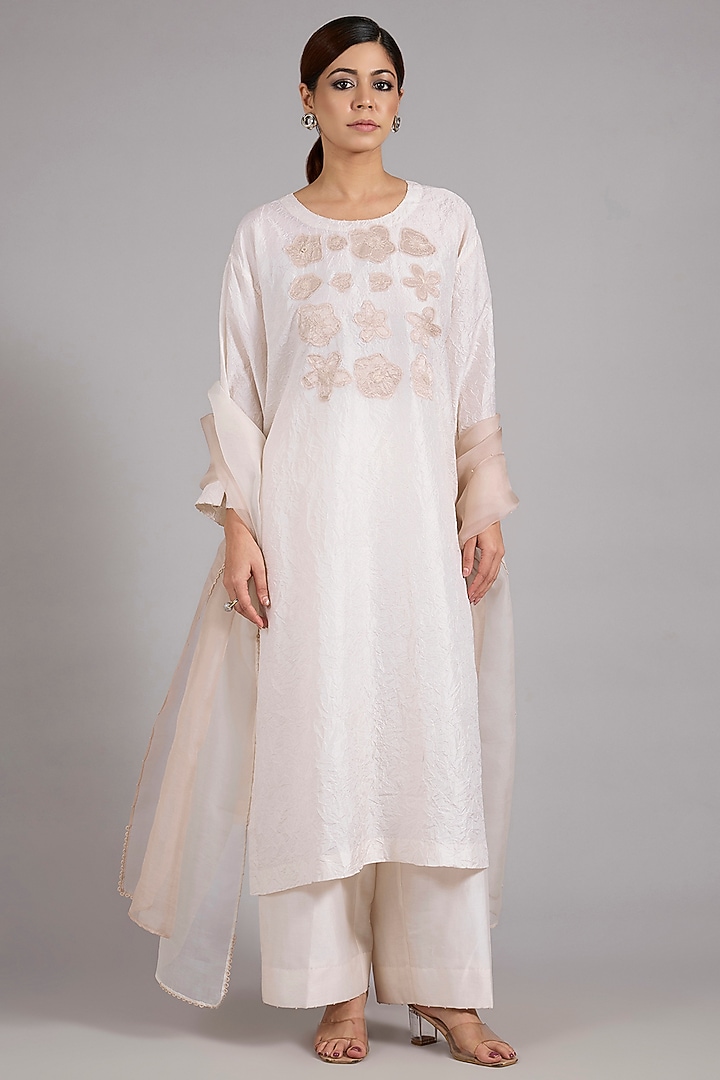 Ivory Mulberry Silk Patchwork Kurta Set by Divyam Mehta at Pernia's Pop Up Shop