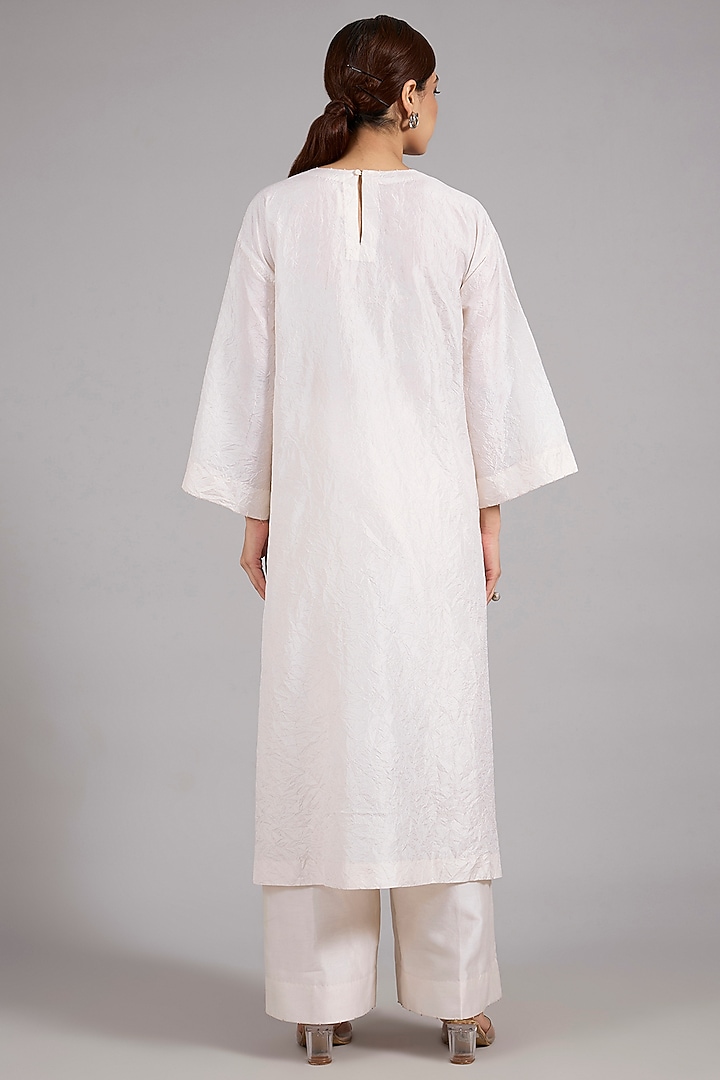 Ivory Mulberry Silk Patchwork Kurta Set by Divyam Mehta at Pernia's Pop Up Shop