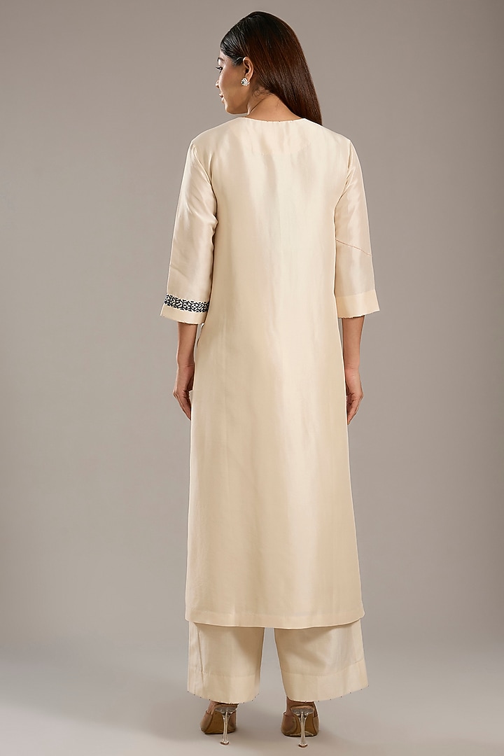 Ivory Dupion Kurta Set by Divyam Mehta at Pernia's Pop Up Shop