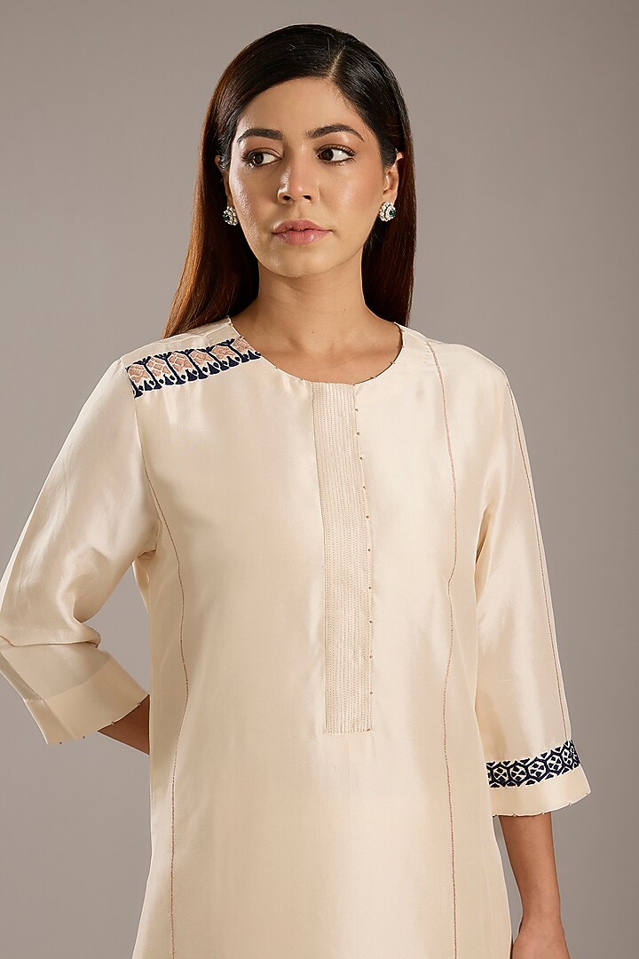Ivory Dupion Kurta Set by Divyam Mehta at Pernia's Pop Up Shop