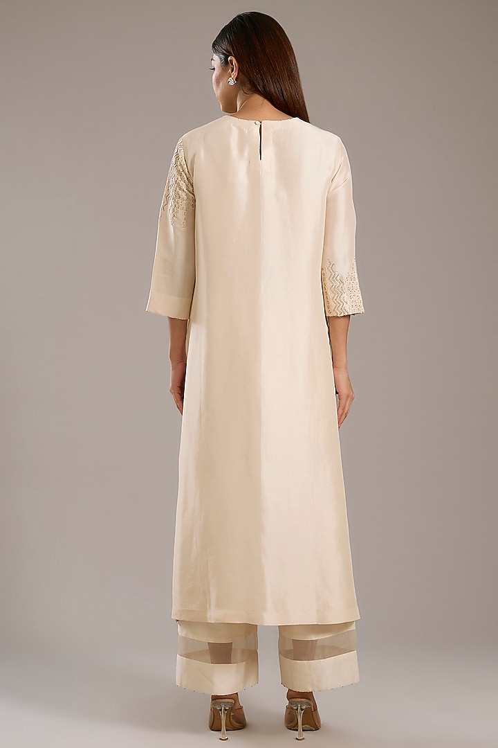 Ivory Dupion Kurta Set by Divyam Mehta at Pernia's Pop Up Shop