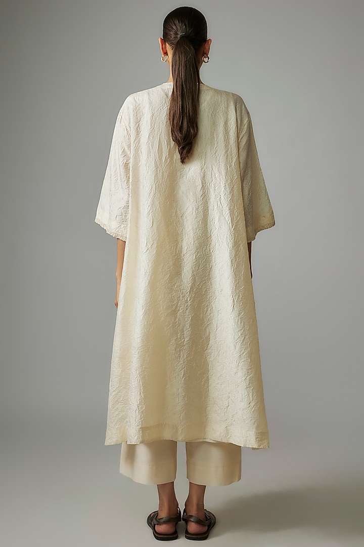 Ivory Mulberry Silk Mirror Embroidered Kurta Set by Divyam Mehta at Pernia's Pop Up Shop
